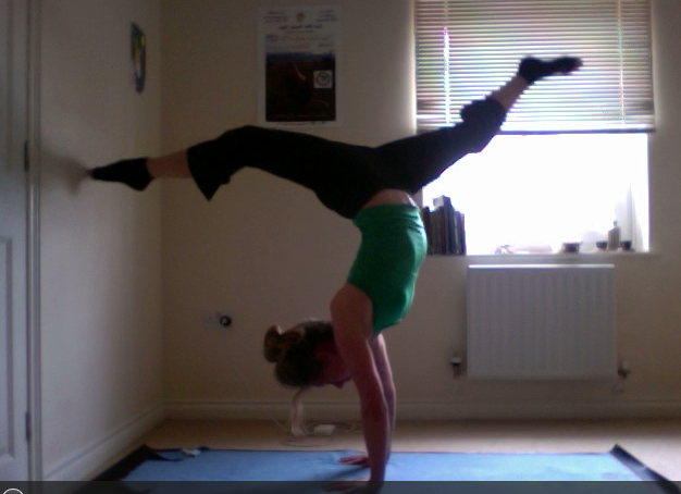Compensating for lifting my head by arching in the back, hips need to be over shoulders more, nice to find some distance in the splits. No blocks